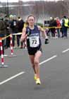 Fastest leg of the day Alyson Dixon (Sunderland Strollers) leads the senior womens Elswick Road Relays after the first leg.
